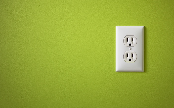 Unseen ants inside an electrical outlet
