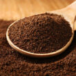 Coffee grounds being used to keep cats away