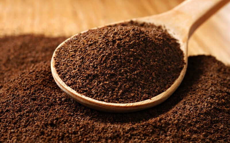 Coffee grounds being used to keep cats away