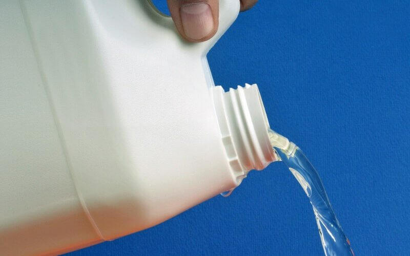 Bleach being poured to kill ants