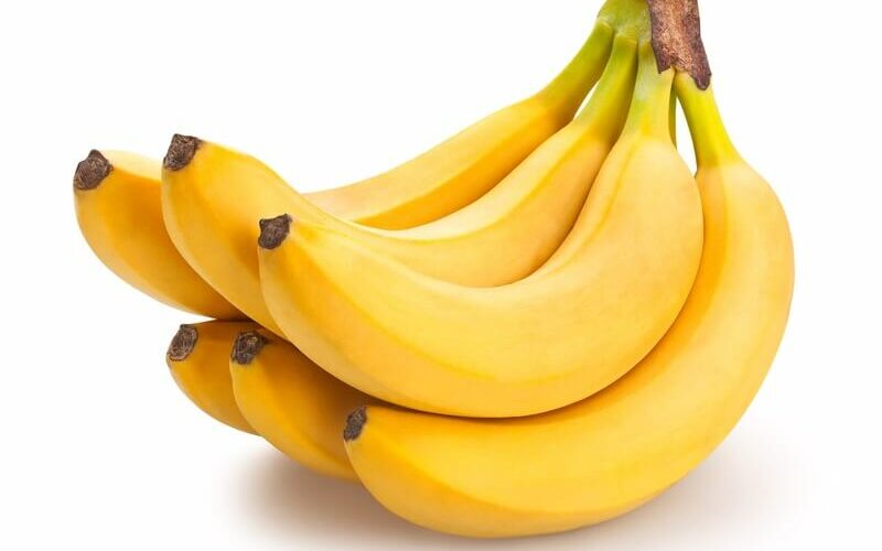 A banana with fruit flies being kept away from it
